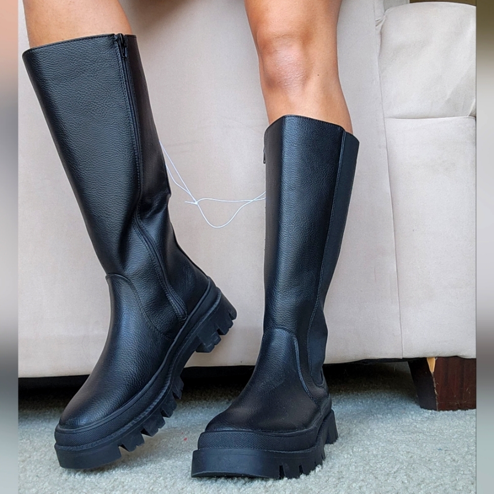 Calf height Chelsea boots